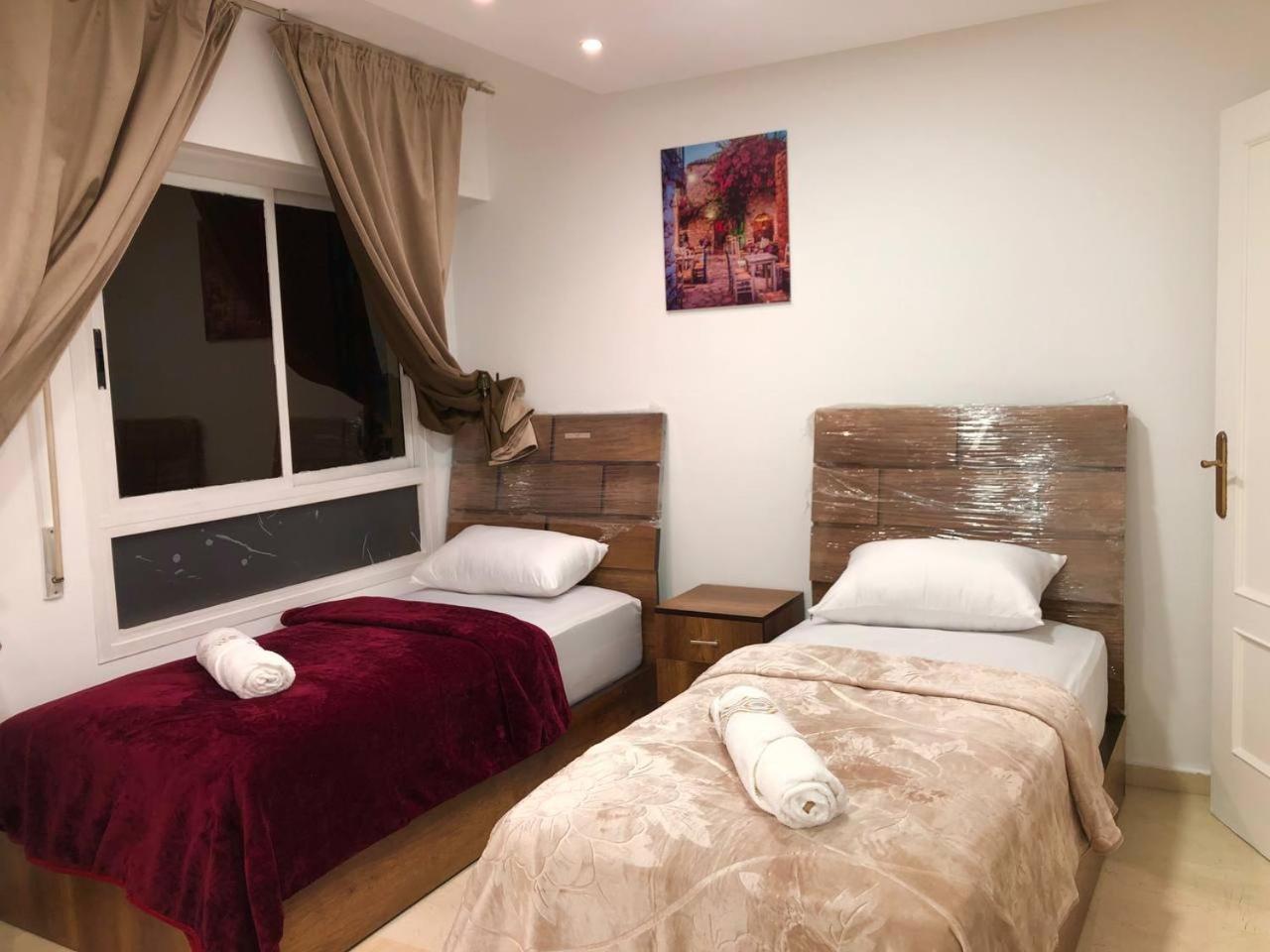 Amazing Appartement " Avec Climatisation " Au Centre Ville En Face Hilton & Gare Train De Tgv De Tanger 2N Buitenkant foto