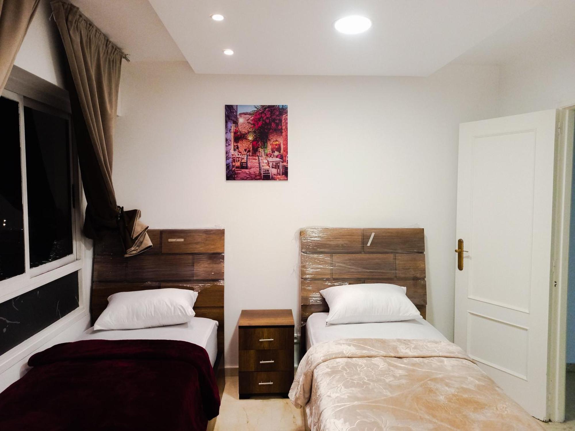Amazing Appartement " Avec Climatisation " Au Centre Ville En Face Hilton & Gare Train De Tgv De Tanger 2N Buitenkant foto